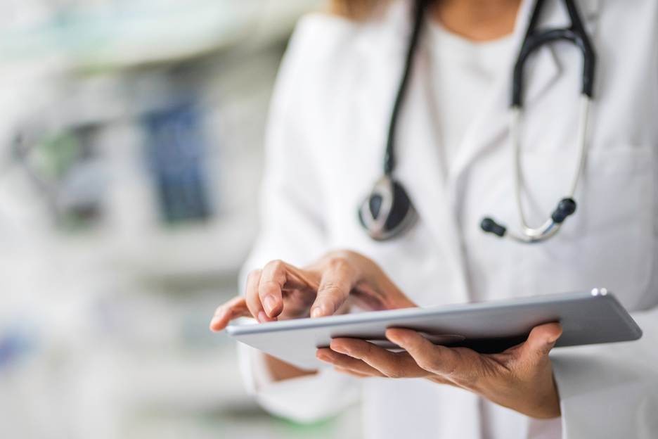 Medical Professional working on digital pad